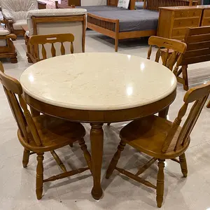 ชุดโต๊ะอาหารกลมขาเซาะร่อง 1.2เมตร พร้อมเก้าอี้ขาเซาะร่อง 4ตัว